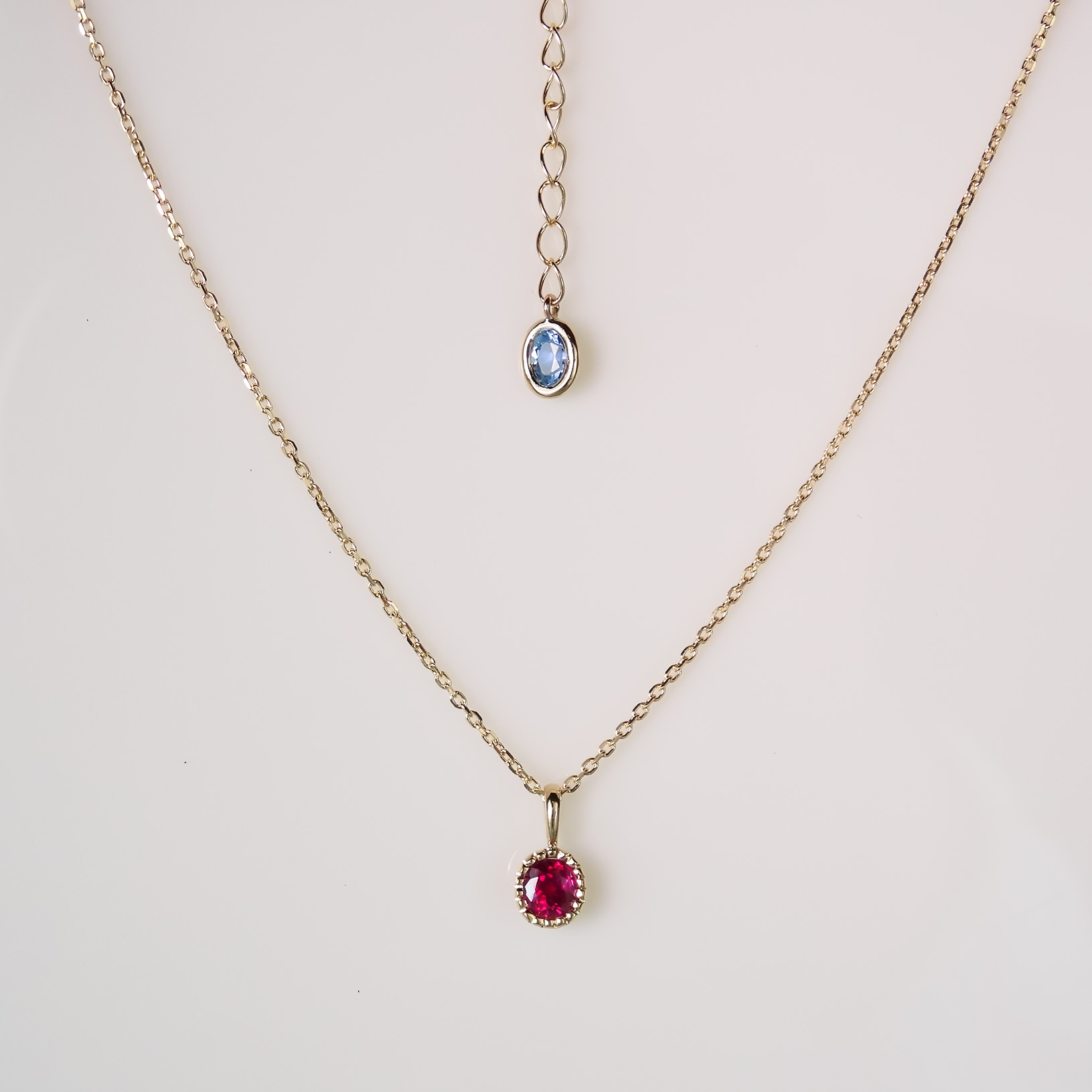 ご家族を繋ぐ　ルビーとアクアマリンのペンダント